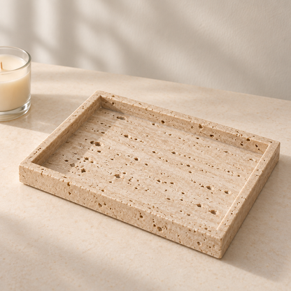 Travertine Catch-All Tray on a cream stone surface in soft daylight