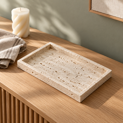 Travertine Catch-All Tray styled on a wooden sideboard in a sunlit living room