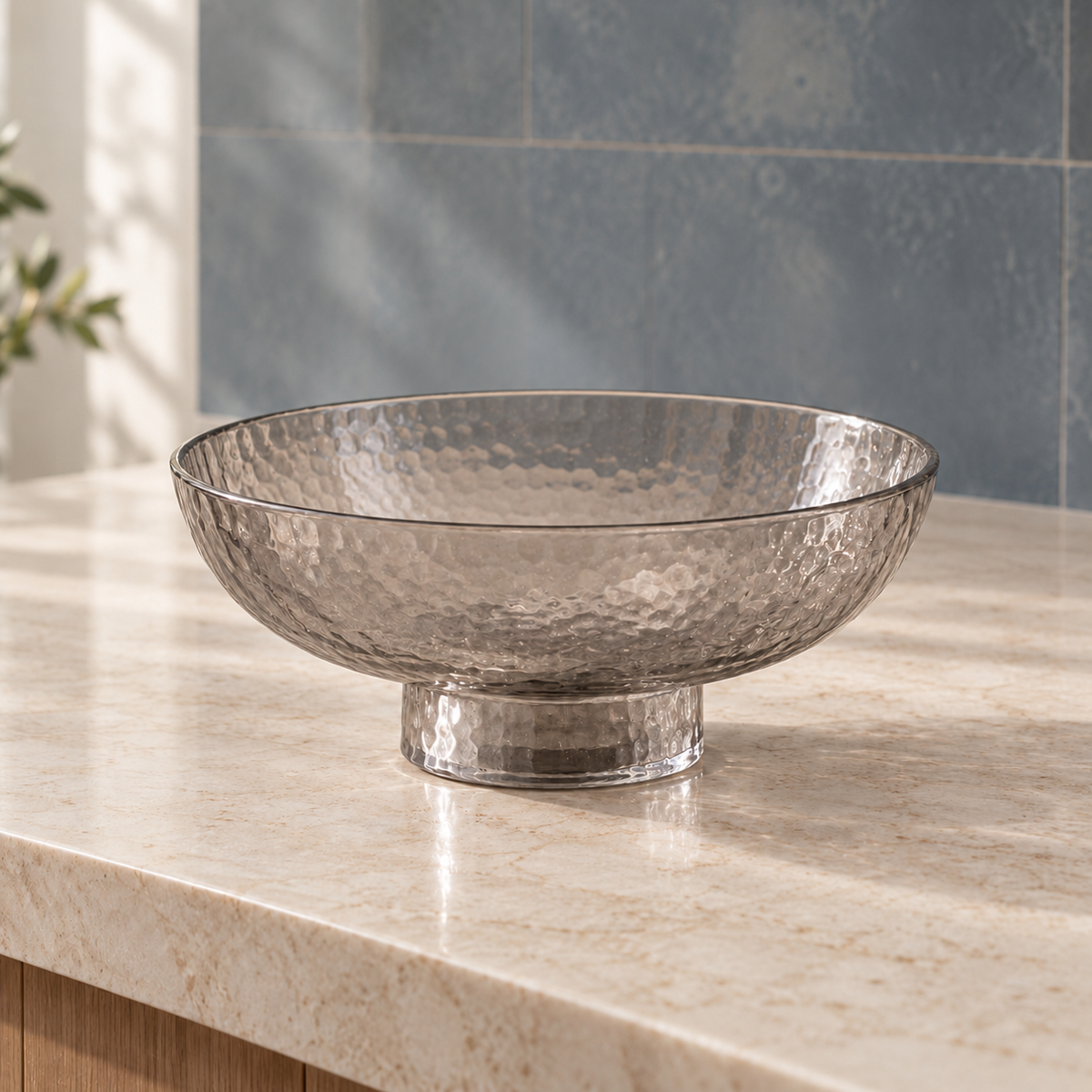 Ribbed Glass Pedestal Bowl on a kitchen counter in warm morning light